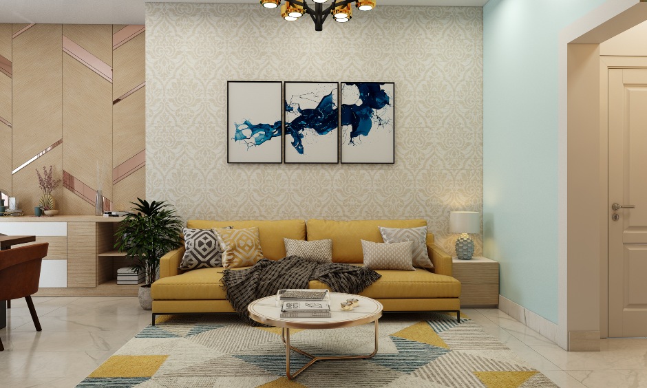 1bhk-home-design-with-yellow-sofa-and-dull-gold-wallpaper